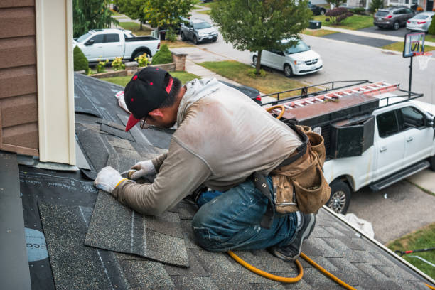 Professional Emergency Roof Repair technician working in Chelmsford, MA